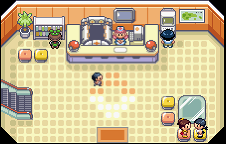 A pixel art image of a Pokemon Center from Pokemon Emerald. May is standing near a bookcase.
